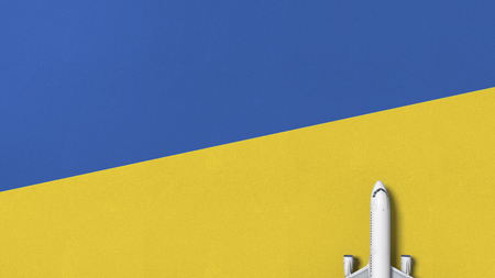 Top-down view of the airplane on the flag of Ukraine. Tourism related conceptual 3D renderingの写真素材