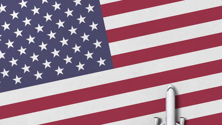 Top-down view of the airplane on the flag of the United States. Tourism related conceptual 3D renderingの写真素材