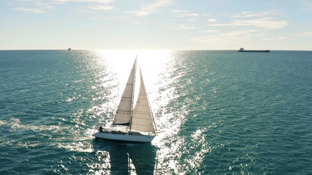 CIVITAVECCHIA, ITALY - JANUARY 1, 2019. Aerial shot of a sailling yacht at seaのeditorial素材