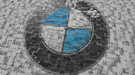 Logo of BMW being made with puzzle pieces, editorial 3D renderingのeditorial素材