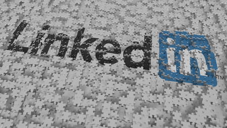 Foto de LINKEDIN logo composing with puzzle pieces, editorial 3D rendering - Imagen libre de derechos