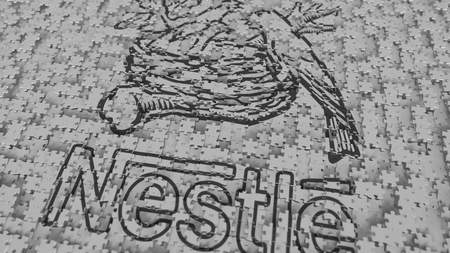 NESTLE logo composing with puzzle pieces, editorial 3D renderingのeditorial素材