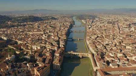 Aerial view of famous Ponte Vecchio and other bridges over Arno river in Florence, Italyの写真素材