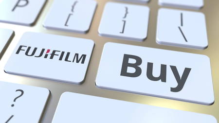 FUJIFILM company logo and Buy text on the keys of the computer keyboard, editorial conceptual 3D renderingのeditorial素材