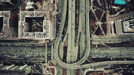 Aerial top down view of a big city road interchange