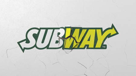 Destroying wall with painted logo of Subway. Crisis conceptual editorial 3D renderingのeditorial素材