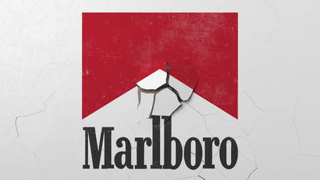Crushing concrete wall with logo of Marlboro. Crisis conceptual editorial 3D renderingのeditorial素材