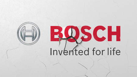 Destroying wall with painted logo of Bosch. Crisis conceptual editorial 3D renderingのeditorial素材