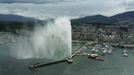 GENEVA, SWITZERLAND - APRIL 27, 2019. Aerial view of famous Jet dEau fountain on the Lake Geneva, main citys landmarkのeditorial素材