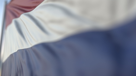 Waving flag of the Netherlands, shallow focus close-up. Realistic 3D renderingの写真素材