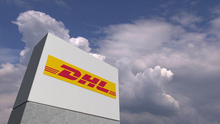 Logo of DHL on a stand against cloudy sky, editorial 3D renderingのeditorial素材