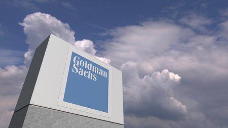 Logo of GOLDMAN SACHS on a stand against cloudy sky, editorial 3D renderingのeditorial素材