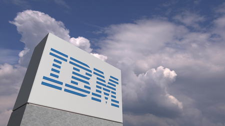 Logo of IBM on a stand against cloudy sky, editorial 3D renderingのeditorial素材