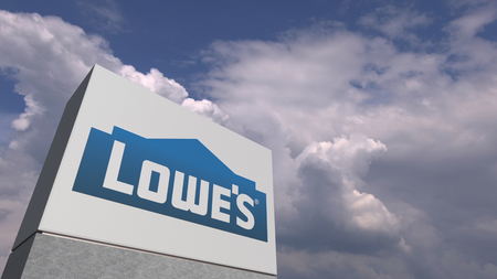 Logo of LOWES on a stand against cloudy sky, editorial 3D renderingのeditorial素材
