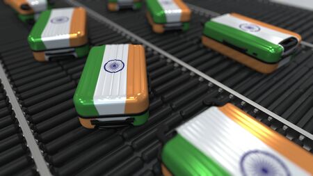 Many travel suitcases featuring flag of India. Indian tourism conceptual 3D renderingの写真素材