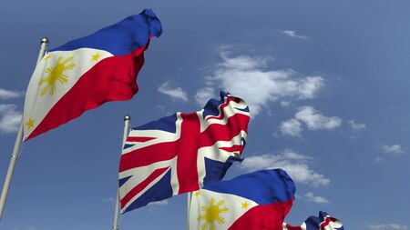 Waving flags of the Philippines and the United Kingdom, 3D renderingの写真素材