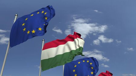 Row of waving flags of Hungary and the European Union EU, 3D renderingの写真素材