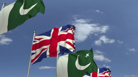 Waving flags of Pakistan and the United Kingdom, 3D renderingの写真素材