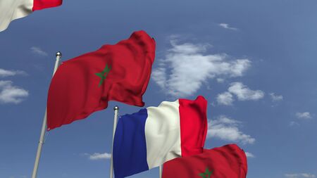 Waving flags of Morocco and France on sky background, 3D renderingの写真素材