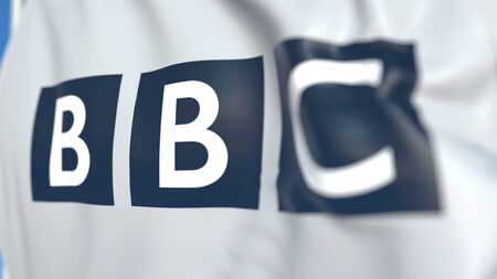 Waving flag with BBC logo, close-up. Editorial 3D rendering