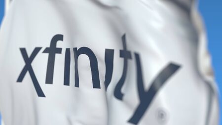 Waving flag with Xfinity logo, close-up. Editorial 3D renderingのeditorial素材