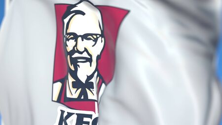Waving flag with Kentucky Fried Chicken KFC logo, close-up. Editorial 3D rendering