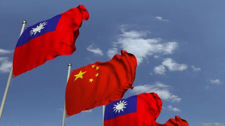 Waving flags of Taiwan and China on sky background, 3D renderingの写真素材
