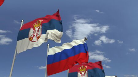 Waving flags of Serbia and Russia on sky background, 3D renderingの写真素材