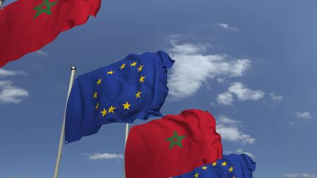 Waving flags of Morocco and the EU on sky background, 3D renderingの写真素材
