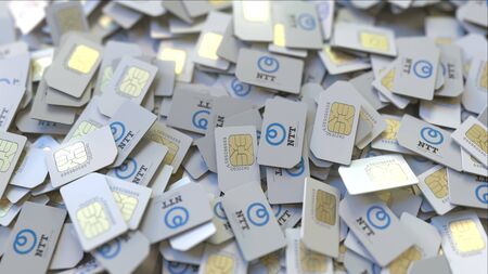 SIM cards with Nippon Telegraph and Telephone Corporation NTT logo, close-up. Editorial telecommunication related 3D renderingのeditorial素材
