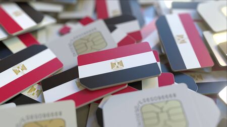 Many SIM cards with flag of Egypt, Egyptian mobile telecommunications related 3D renderingの写真素材
