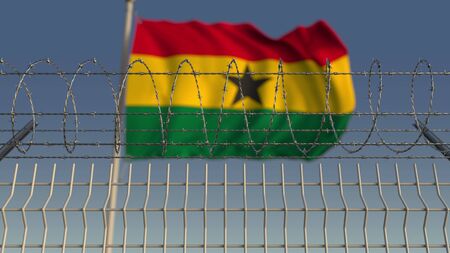 National flag of Ghana behind barbed wire fence. Conceptual 3D renderingの写真素材