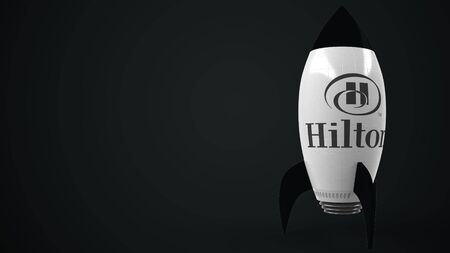 Logo of HILTON on a toy rocket. Editorial conceptual success related 3D renderingのeditorial素材