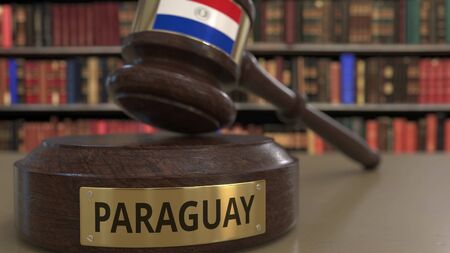 Flag of Paraguay on falling judges gavel in court. National justice or jurisdiction related conceptual 3D renderingの写真素材