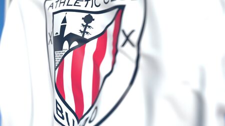 Waving flag with Athletic Bilbao football club logo, close-up. Editorial 3D rendering