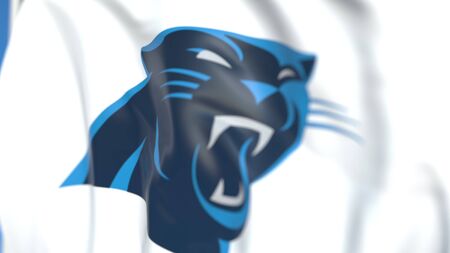 Flying flag with Carolina Panthers team logo, close-up. Editorial 3D renderingのeditorial素材