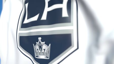 Waving flag with Los Angeles Kings NHL hockey team logo, close-up. Editorial 3D renderingのeditorial素材