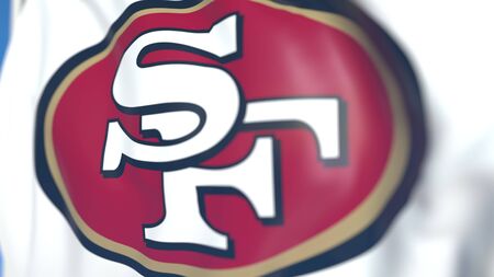 Waving flag with San Francisco 49Ers team logo, close-up. Editorial 3D rendering