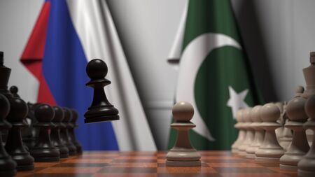 Flags behind pawns on the chessboard. Political rivalry related 3Dの写真素材