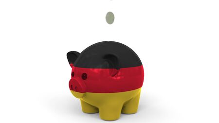 Coins fall into piggy bank painted with flag. Conceptual 3Dの写真素材