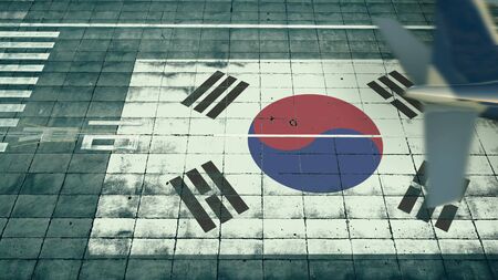 Aerial view of a landing airplane and flag of South Korea on the airfield of an airport. Air travel related conceptual 3D renderingの写真素材
