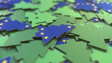 Details of flag of the European Union on the souvenir Christmas trees. Winter holidays related 3D renderingの写真素材