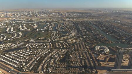 Aerial shot of luxury Emirates Hills and Jumeirah Islands communities in Dubai, UAEの写真素材