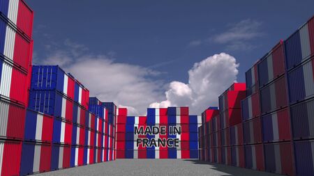Many cargo containers with MADE IN FRANCE text and national flags. French import or export related 3D renderingの写真素材