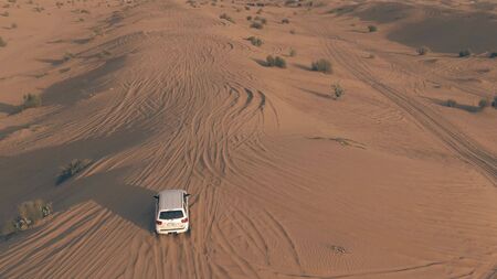 DUBAI, UNITED ARAB EMIRATES - JANUARY 4, 2020. Aerial tracking shot of a Toyota Sequoia full-sized...