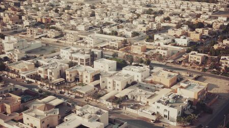 Aerial view of low-rise residential houses and streets in Dubai, United Arab Emiratesの写真素材