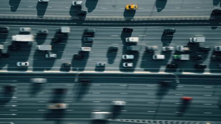 Aerial top down shot of an urban highway traffic on rush hourの写真素材