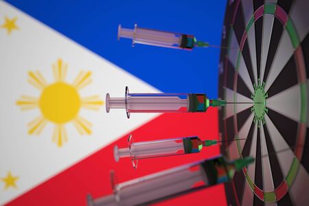 New Coronavirus vaccine syringes with text and flag of the Philippines as a background. medical research and vaccination, 3D renderingの写真素材