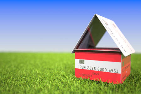 Flag of Austria on plastic bank card house in the grass. Mortgage related 3D renderingの写真素材
