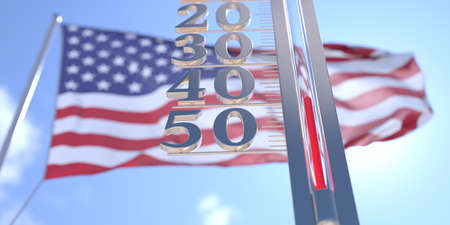 Minus 40 degrees centigrade on a thermometer measuring near flag of the USA. Very cold weather...